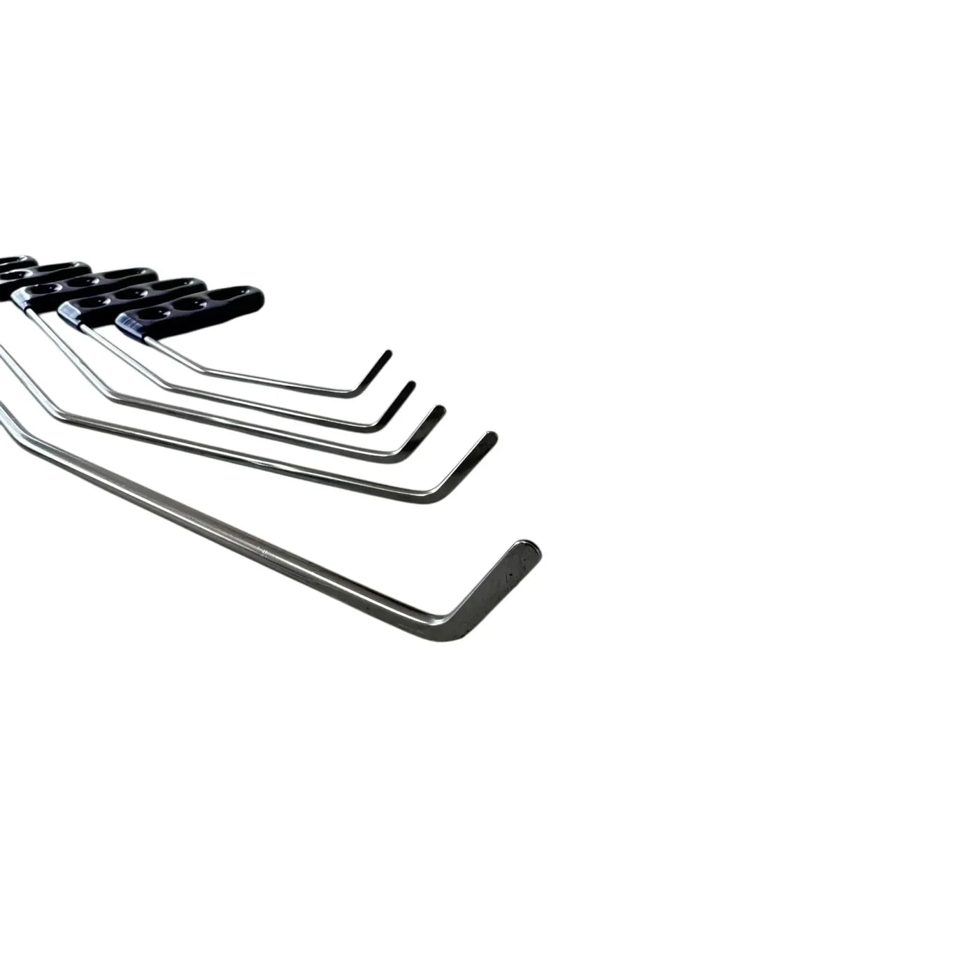 10pc hand tool set by Auto Equipment International displayed on a wooden surface, showcasing various tools and their designs.